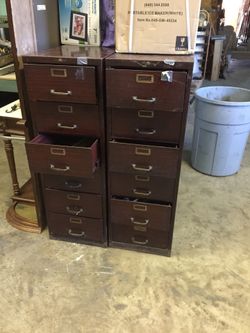 2 old sturdy medal file cabinets.