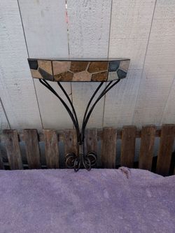 Heavy duty wrought iron plant or knick knack holder - shelf.