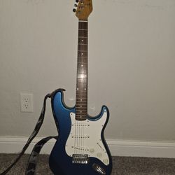 Jay Turser Electric Guitar and Small Amplifier 