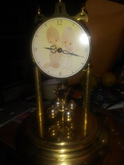 Precious moments vintage clock..
