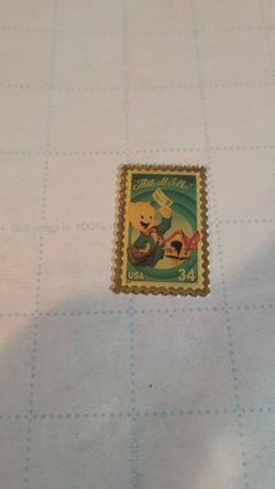 The product is an enameled 34¢ Porky Pig "That's All Folks!" United States postage stamp featuring the iconic animation character. Produced by Jonatha