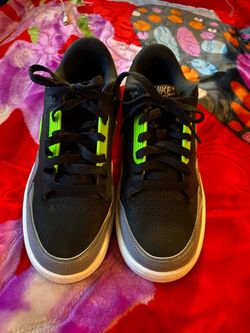 Nike Alphaballer Low sneakers featuring a black and gray upper with neon green accents size 7