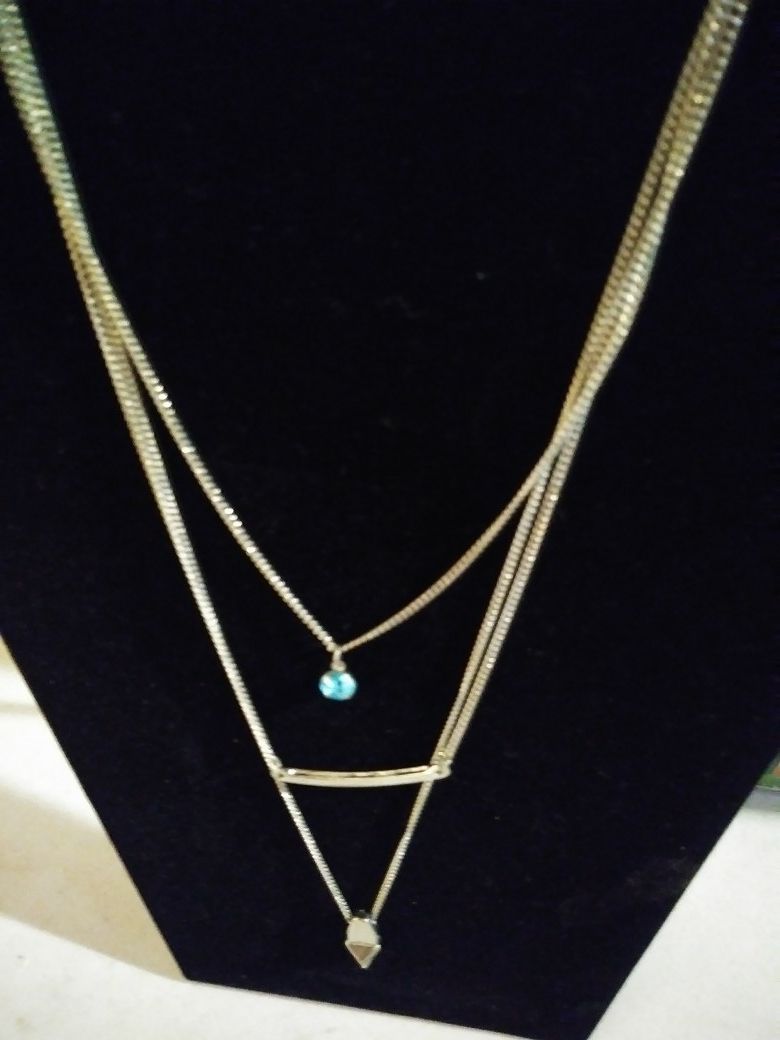 Joe Boxer Necklace with blue stone in the middle