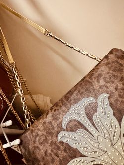 Brown Cowhide Handbag with Floral Studded Detail