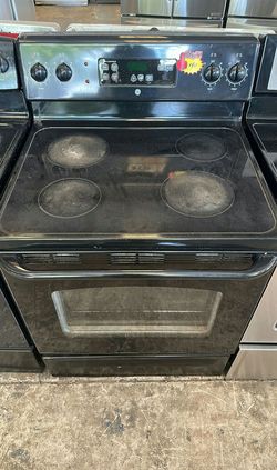 Black GE Electric Range with Glass Top