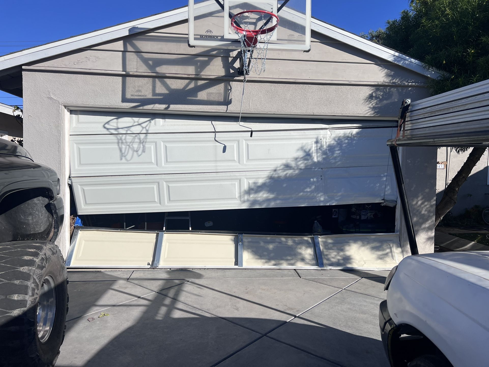 GARAGE DOORS SPRINGS INSTALLS