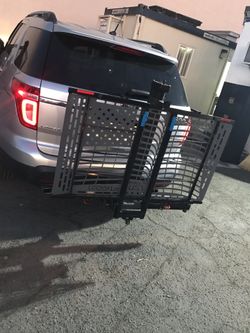 Wheel chair storage ramp