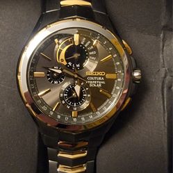 Men's Coutura Perpetual Solar Alarm
Quartz Chronograph Two Tone Bracelet
