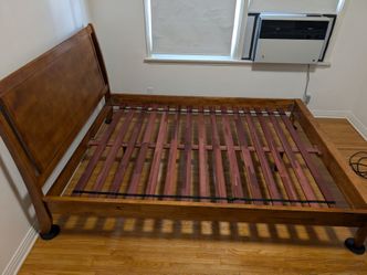 Queen sized bed frame - wood