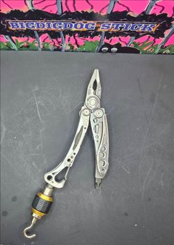 Leatherman tool , plus attachment .
