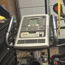 Elliptical Machine And a Rowing Machine. 