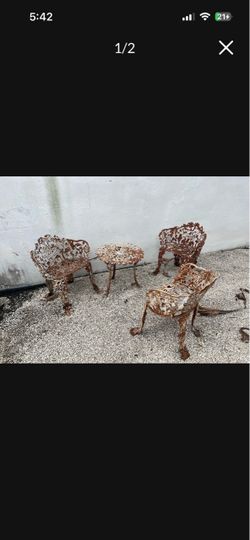 Full set of heavy cast iron vintage garden furniture