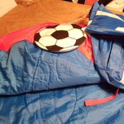 Soccer sleeping bag for a boy