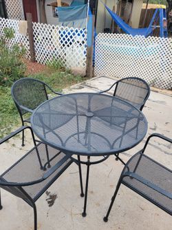 Wrought Iron Table with 4 Chairs