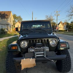 1998 Jeep Wrangler TJ 6 Cylinders Automatic.   124113 Miles.
