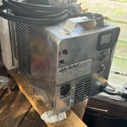 Lester Electrical, Stainless Steel Finish. Vintage golf cart battery charger.