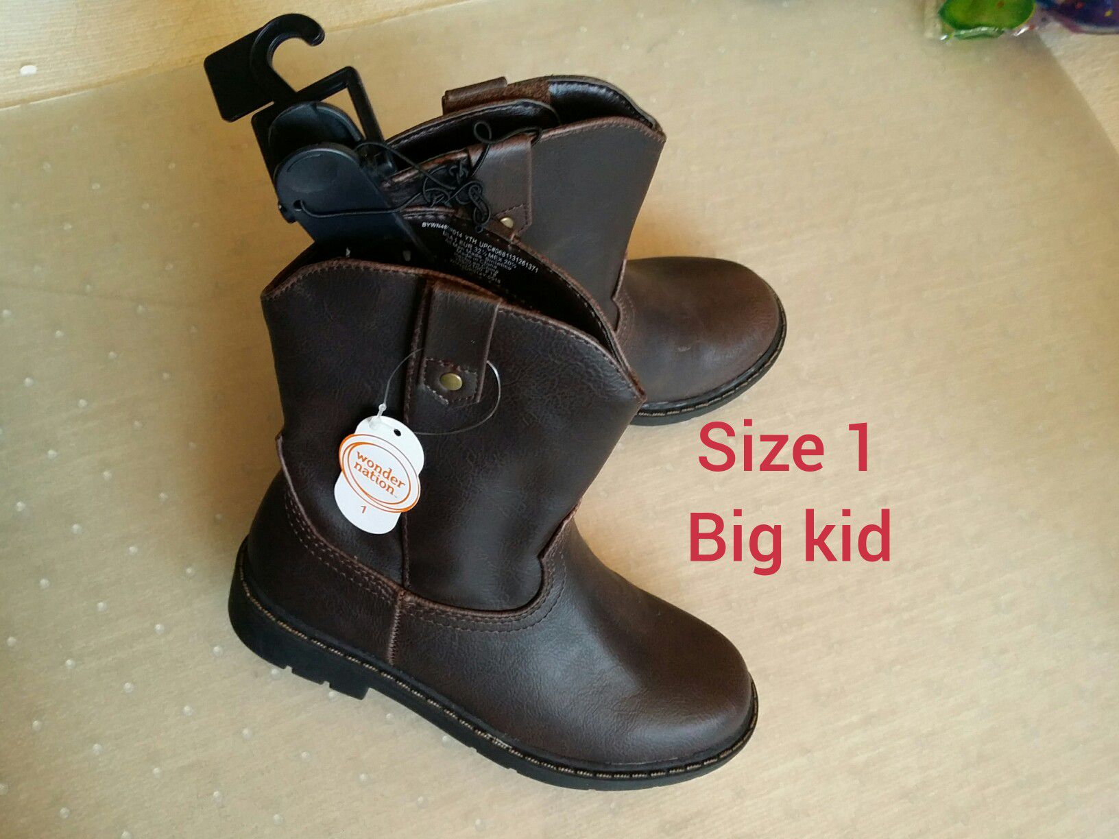 Brand new big kid boots. Size 1
