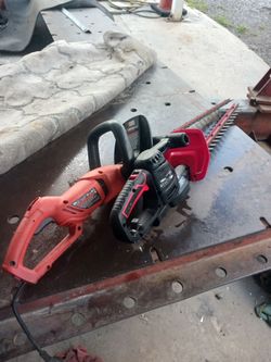 Two electric garden trimmers in excellent condition