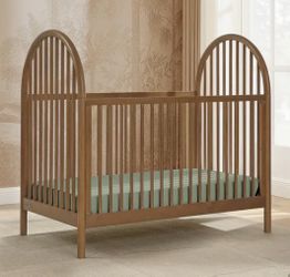 Convertible crib in honey wood