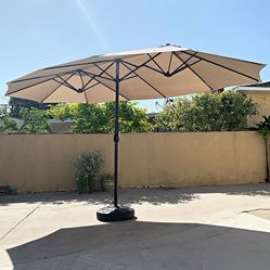 (New in box) $130 Large 15x9 FT Double Sided Umbrella with Weight Base set (Beige color)