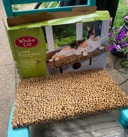 Whisker City Leopard Window Perch New Whisker City Leopard Cat Window Perch is a cozy, adjustable cat hammock designed to offer indoor cats a safe, el