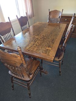 Oak dining table with chairs