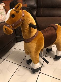 KIDS MECANICAL HORSE NEW  OPEN BOX