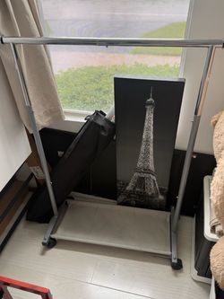 Freestanding Clothing Rack with Wheels