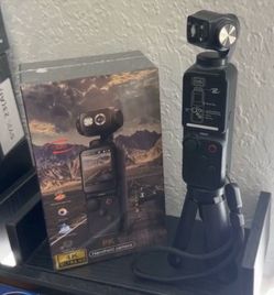 Vlogging camera with tripod