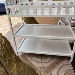 Clean and in good condition changing crib measures 36.5 inches wide, 19 inches high, and 34 inches tall.