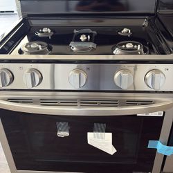 New L G. Gas  Stove And Oven. And Grille 