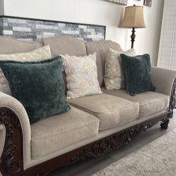 Light brown sofa and loveseat