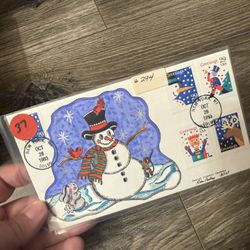 Hand-painted First Day Cover (FDC) featuring the 1993 29-cent "Smiling Snowman" Christmas stamp