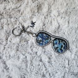 BLUE KEYCHAIN GLASSES BY MICHAEL KORS