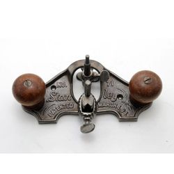 This is a vintage Stanley No. 71 wood router plane with one cutter, patented in 1884. It is an original product made in the United States. Small chip 