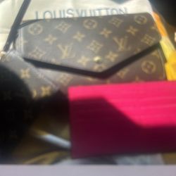 Purse By Louis Vuitton
