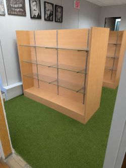 Two sided wood and glass shelving fixtures