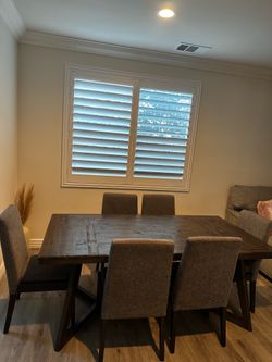 Rustic wooden table with 6 chairs