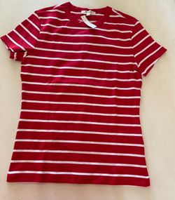 This Madewell red and white striped '90s Crewneck Tee is crafted from compact cotton and features a slim fit.  * Brand: Madewell. *  * Color: Varsity 