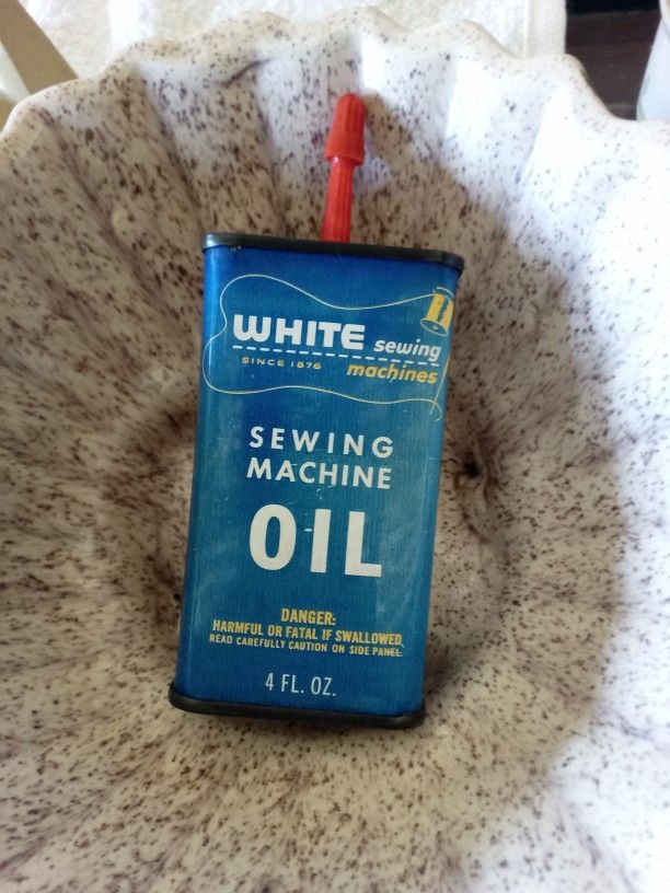 Old White Sewing Machine Oil