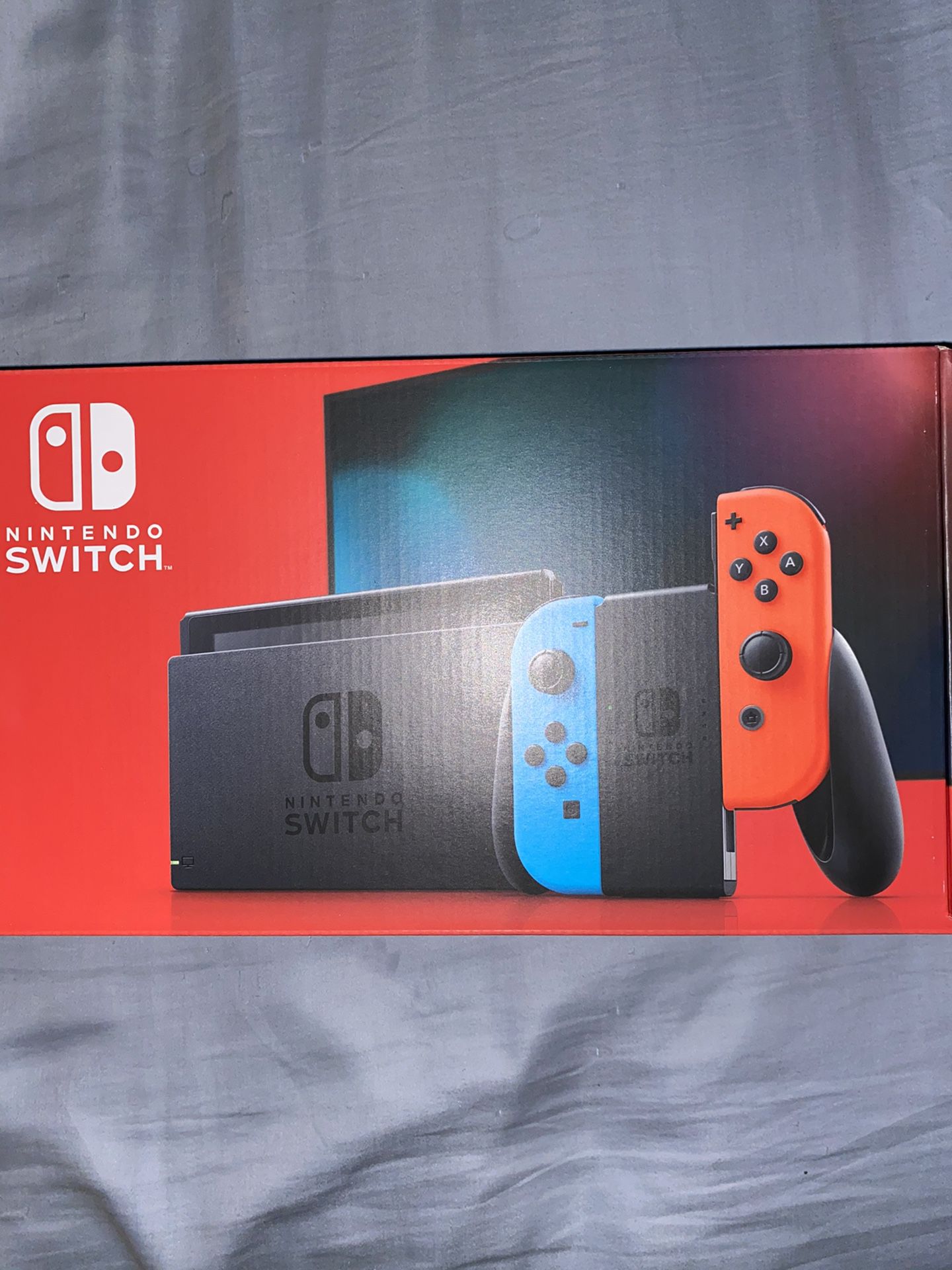 Nintendo Switch With Neon Blue and Neon Red Joycons