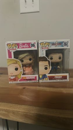 2 Slightly Worn Bobble Heads