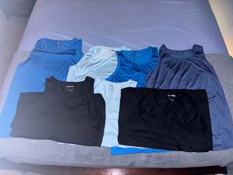 7 tank-tops. 10 dolllars each.