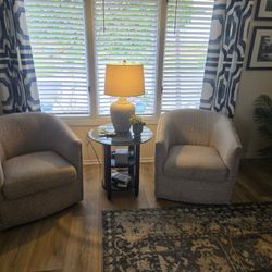 2 SWIVEL BARREL CHAIRS 