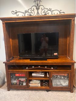 Entertainment center with book shelves tv included