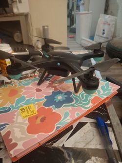 Black RC Quadcopter Drone with Teal Accents