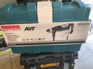 Photo Brand new makita rotary hammer top of line hr5212c model firm price