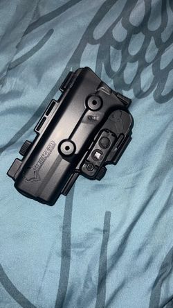 Left handed ShapeShift Paddle Holster for Glock 17 by Alien Gear Holsters