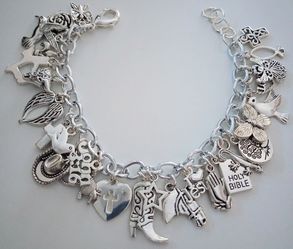 Silver-Tone Religious Cowgirl Charm Bracelet for $40