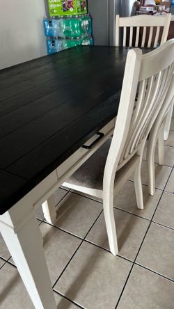 Dining table, 4 chairs, and a bench